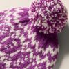 HOL24-FAHERTY-ACCESSORIES-YC0096-501-PURPLE-FAIRISLE-VALLEY-FAIRISLE-POM-BEANIEDETAIL1.jpg