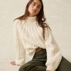 HOL24-FAHERTY-WOMENS-WYH2409-CRM-FROST-CABELKNIT-SWEATER-CREAM_OM_EDITORIAL_1.jpg