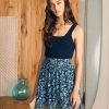 SP24-faherty-womens-WBS2429-BNF-eliza-mini-skirt-blue-esna-floral_OM_EDITORIAL_1.jpg